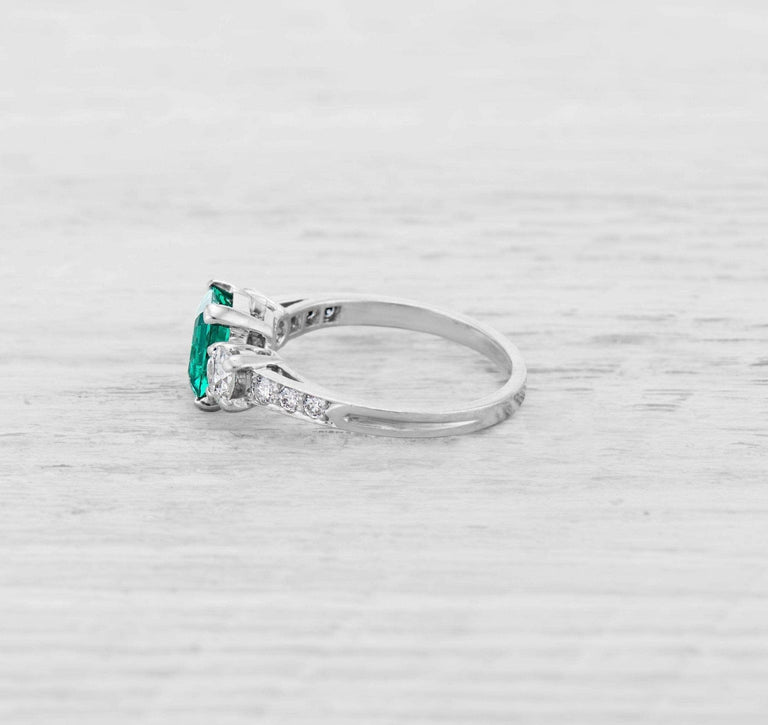 1.00 CARAT ART DECO EMERALD AND DIAMOND RING