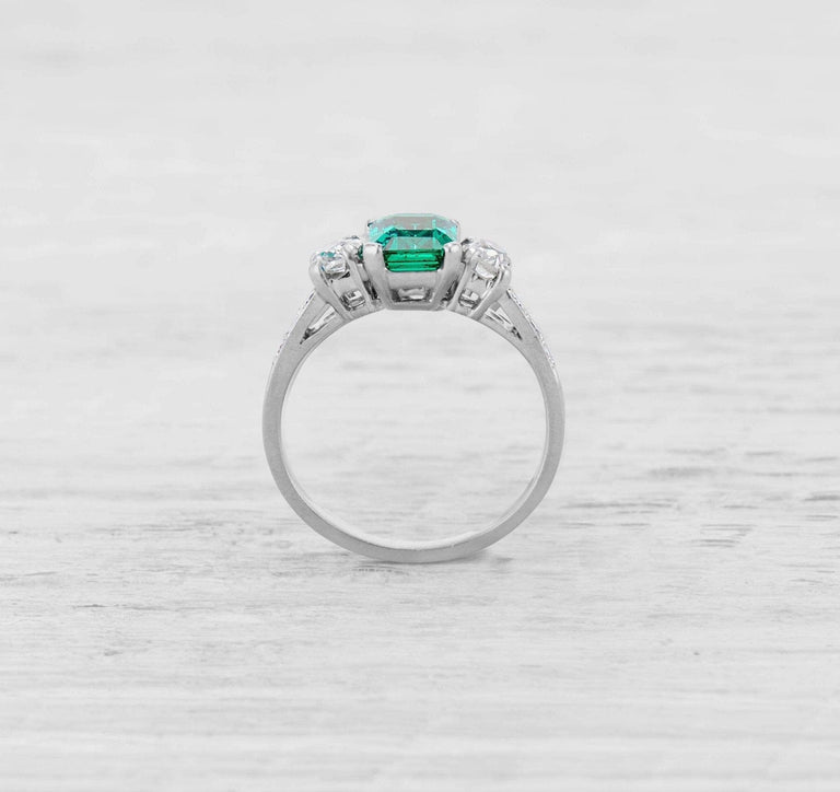 1.00 CARAT ART DECO EMERALD AND DIAMOND RING