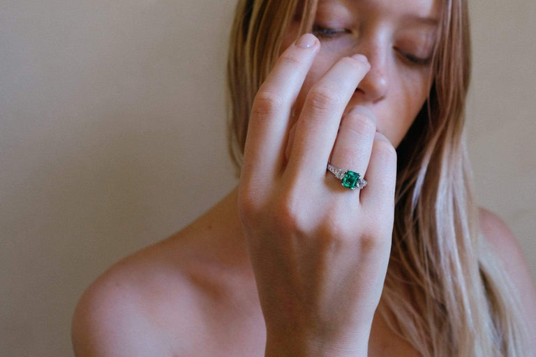 1.00 CARAT ART DECO EMERALD AND DIAMOND RING