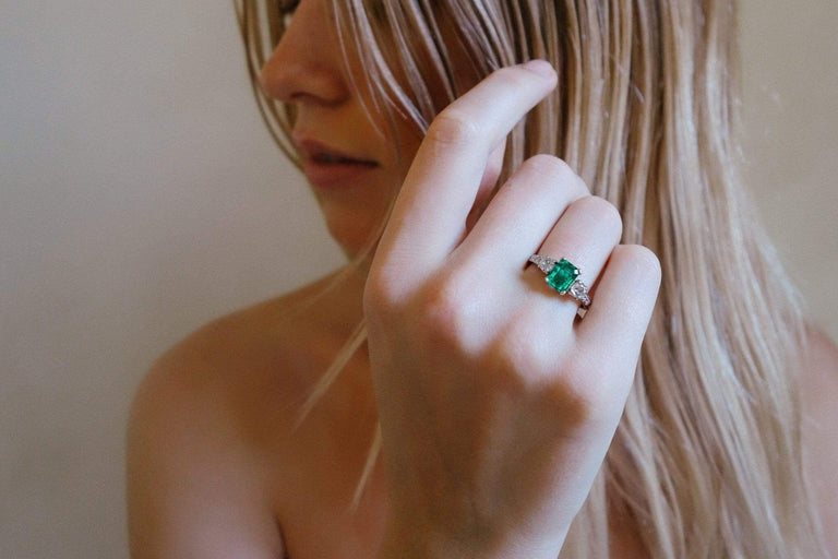 1.00 CARAT ART DECO EMERALD AND DIAMOND RING