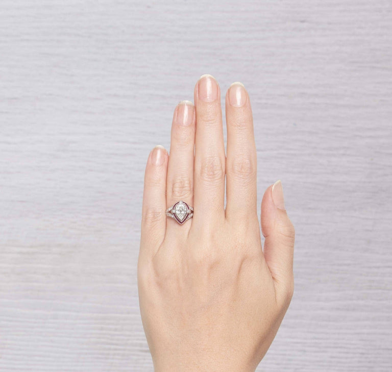 1.00 CARAT ART DECO PEAR DIAMOND AND RUBY ENGAGEMENT RING