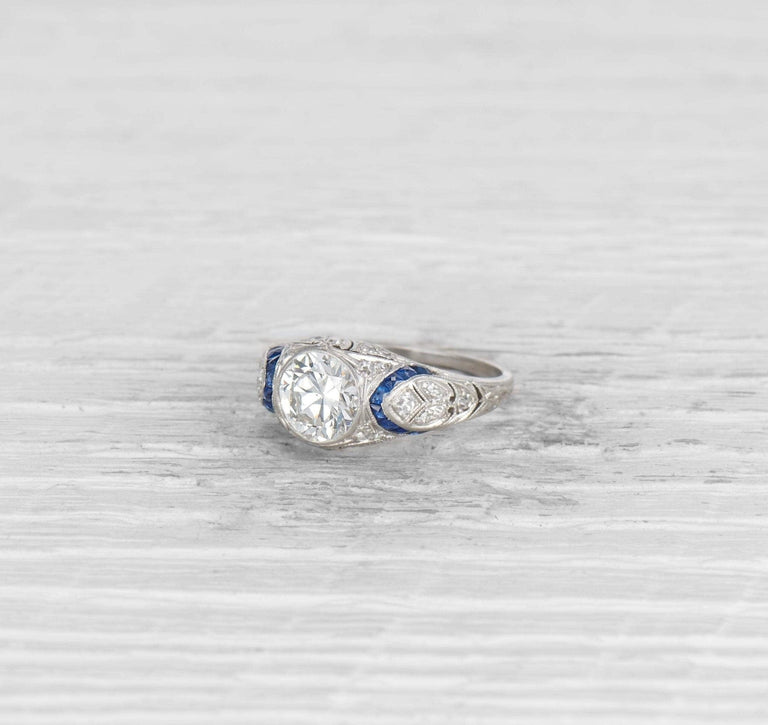 1.10 CARAT ART DECO DIAMOND AND SAPPHIRE ENGAGEMENT RING