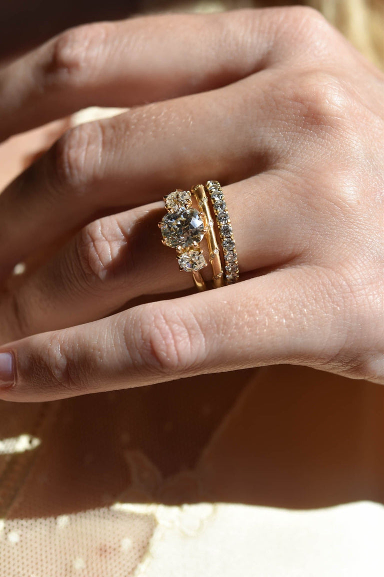2.26ct Old Mine Cut Three-Stone Diamond Ring in 18K Yellow Gold | Celeste on a hand