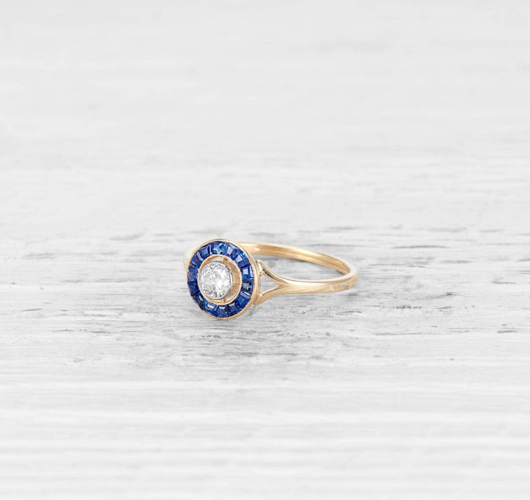.20 CARAT ART DECO DIAMOND AND SAPPHIRE TARGET RING