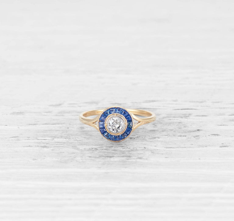 .20 CARAT ART DECO DIAMOND AND SAPPHIRE TARGET RING
