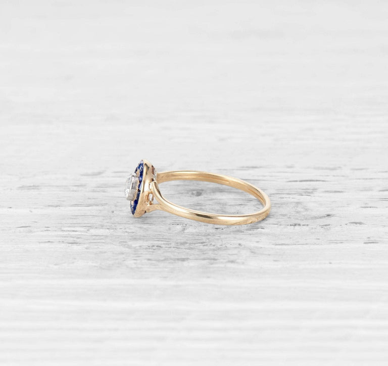 .20 CARAT ART DECO DIAMOND AND SAPPHIRE TARGET RING