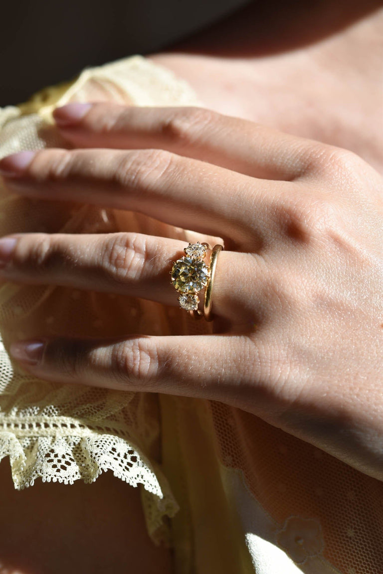 3.06ct Antique Old Mine Diamond Three Stone 18k Gold Engagement Ring | Celeste Solitaire on a hand