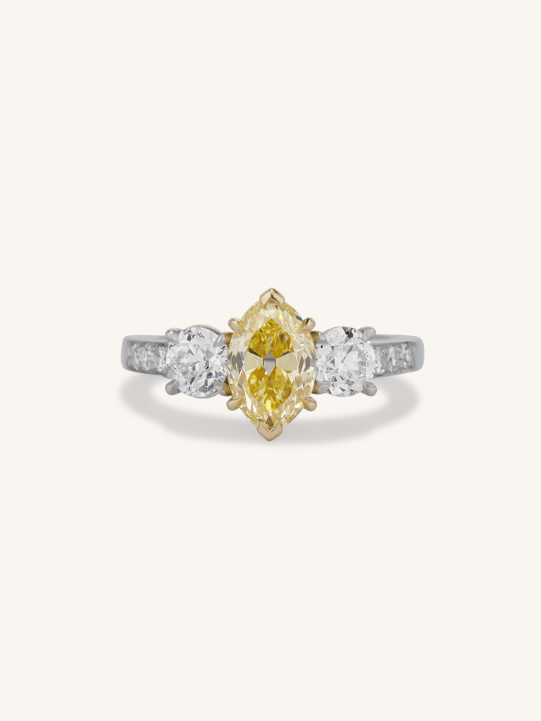 Aurelia ring with 1.56ct Fancy Intense Yellow oval diamond and old European cut side stones in platinum