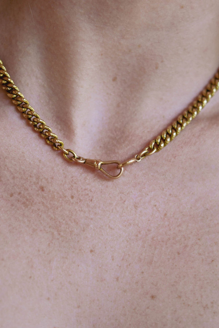 Late Georgian–Early Victorian 18k hammered hollow Albert chain with original antique clasp on a model