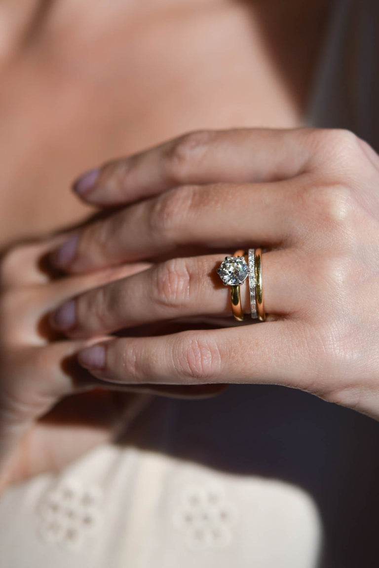 Seren 1.80ct old European cut diamond solitaire ring with low-profile setting in yellow gold on a hand - 2