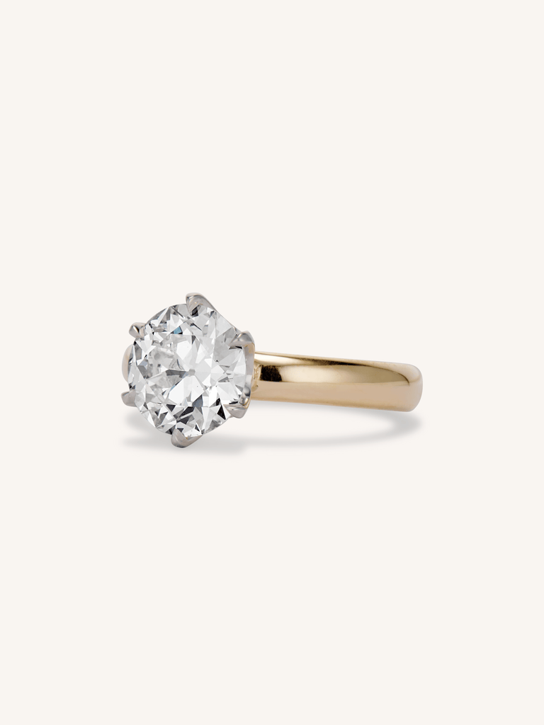 Seren 1.80ct old European cut diamond solitaire ring with low-profile setting in yellow gold on a hand - 3/4