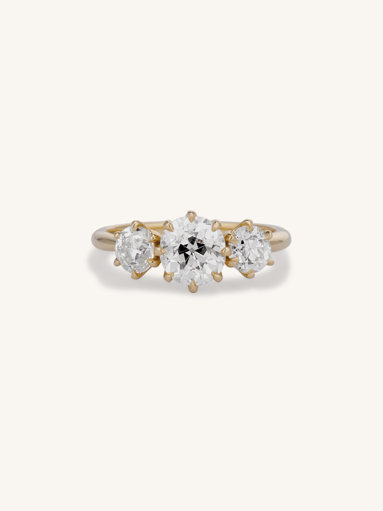Strela 1.27 old European cut three-stone engagement ring in 18k yellow gold