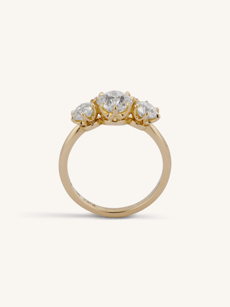 Strela 1.27 old European cut three-stone engagement ring in 18k yellow gold - profile