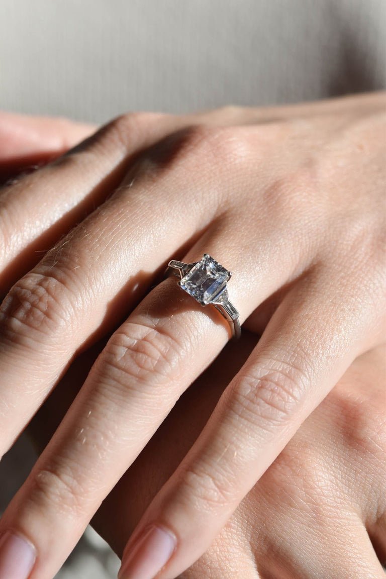 Tiffany & Co. Art Deco 1.91 Carat Emerald Cut Vintage Engagement Ring on a hand