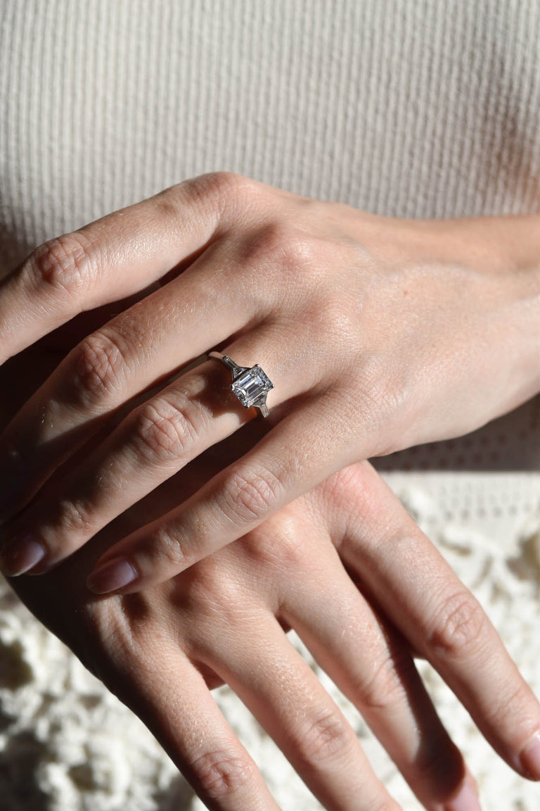 Tiffany & Co. Art Deco 1.91 Carat Emerald Cut Vintage Engagement Ring on a hand