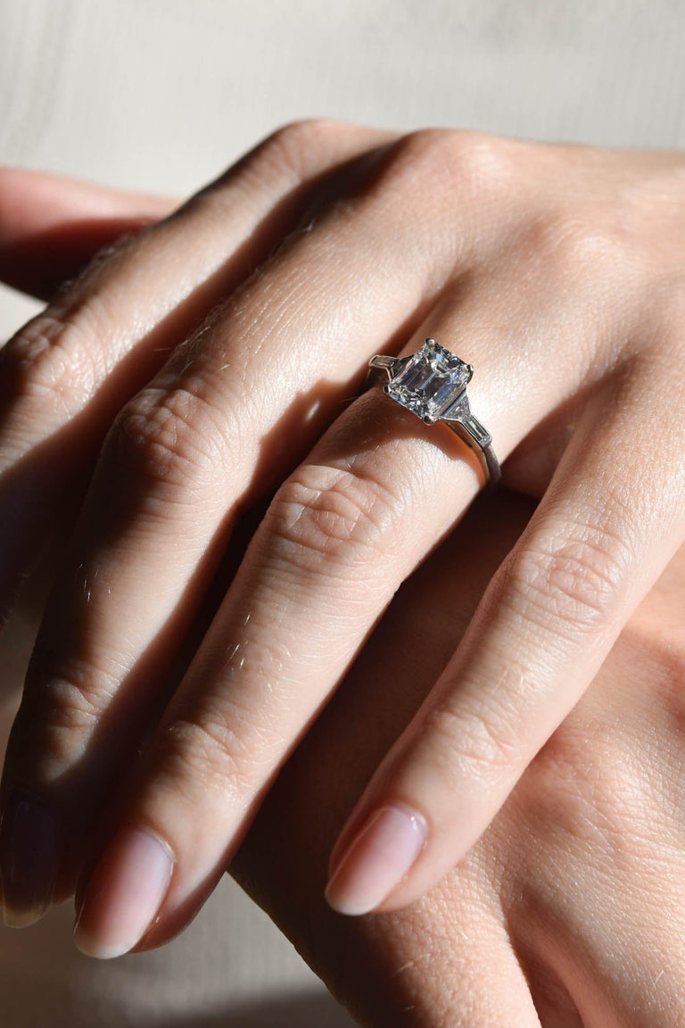 Tiffany & Co. Art Deco 1.91 Carat Emerald Cut Vintage Engagement Ring on a hand 4