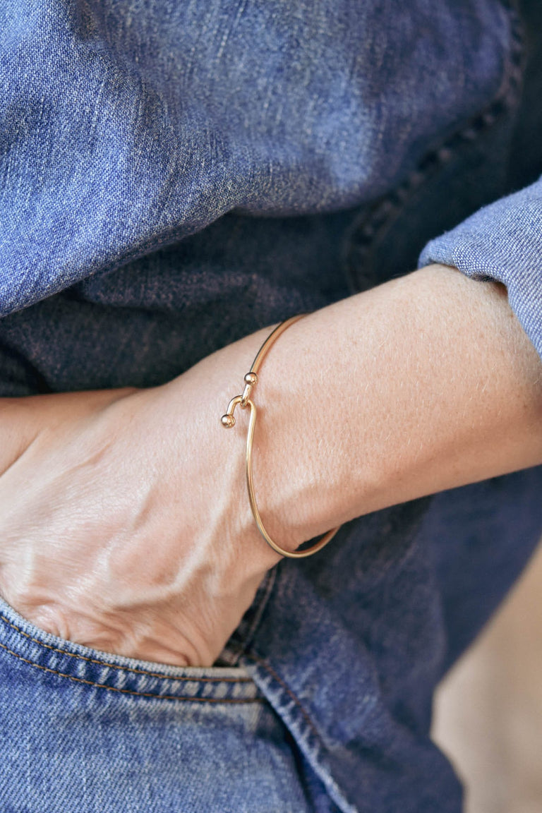 Tiffany & Co. Gold Bypass Vintage Bangle on a model