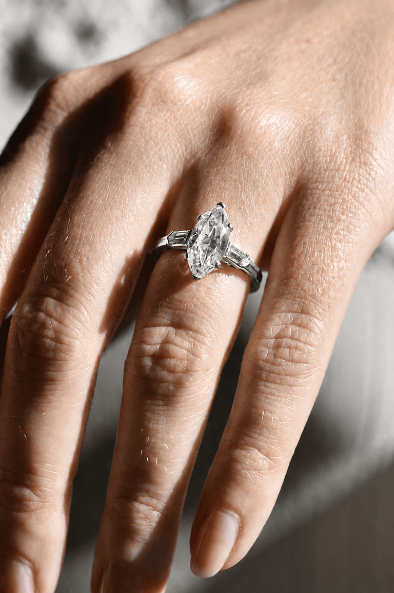 Tiffany & Co. Mid-Century 2.65 Carat Marquise Cut Diamond Vintage Engagement Ring on a hand