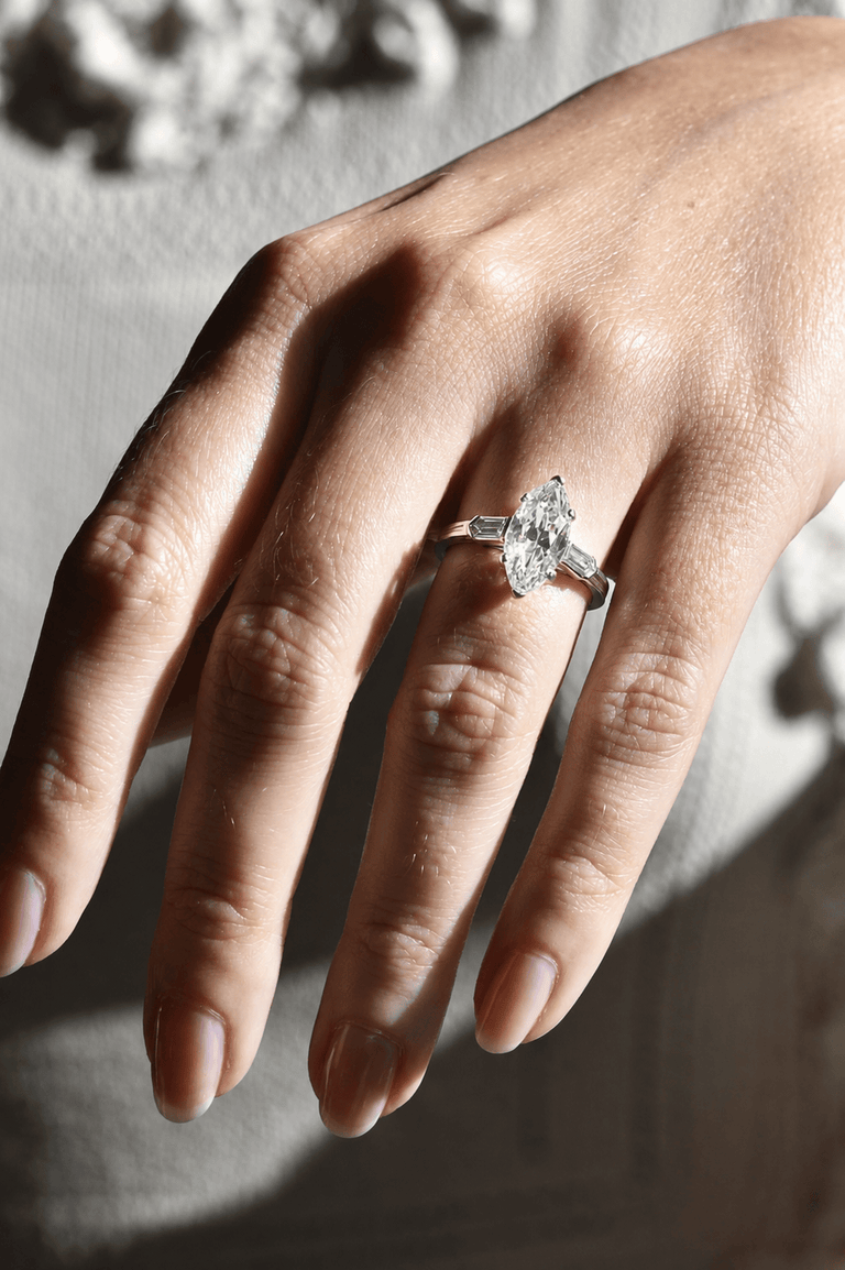 Tiffany & Co. Mid-Century 2.65 Carat Marquise Cut Diamond Vintage Engagement Ring on a hand 2