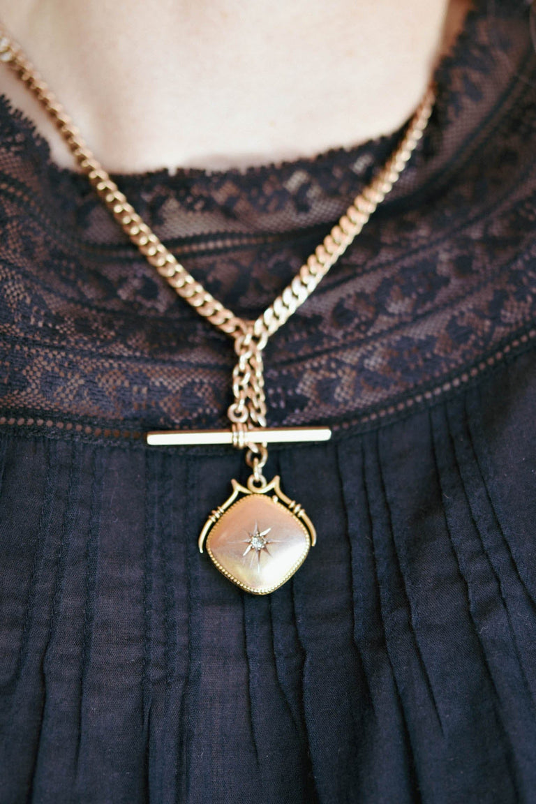 Victorian Gold Locket & Watch Fob Antique Necklace on a model