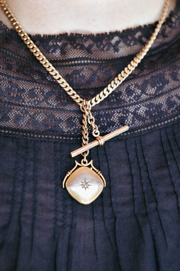 Victorian Gold Locket & Watch Fob Antique Necklace on a model 3