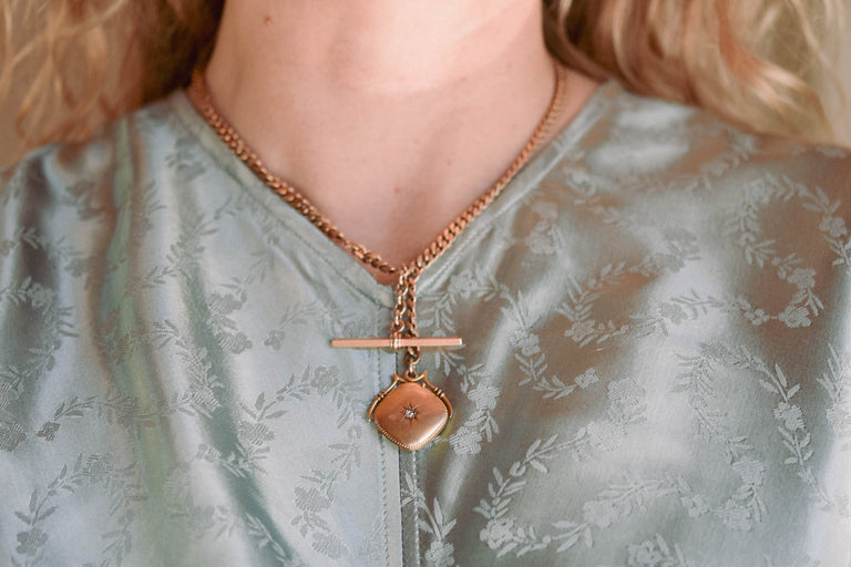 Victorian Gold Locket & Watch Fob Antique Necklace on a model