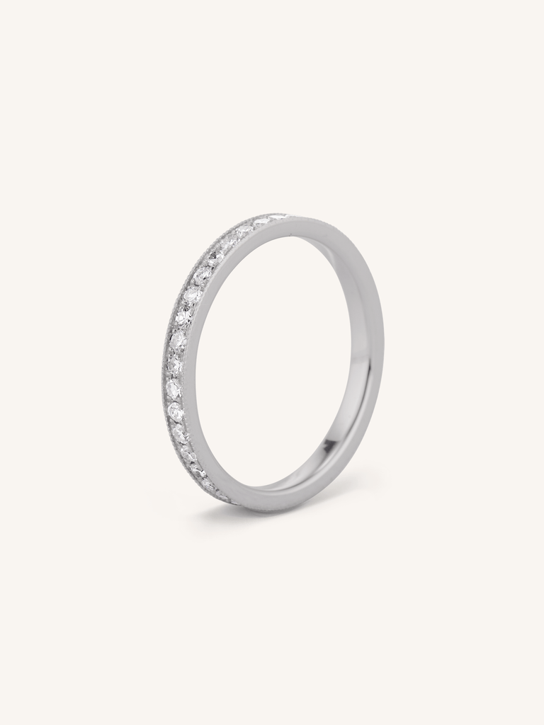 Vintage Inspired Antique Diamond Eternity Band in Platinum | Étoile with an antique engagement ring