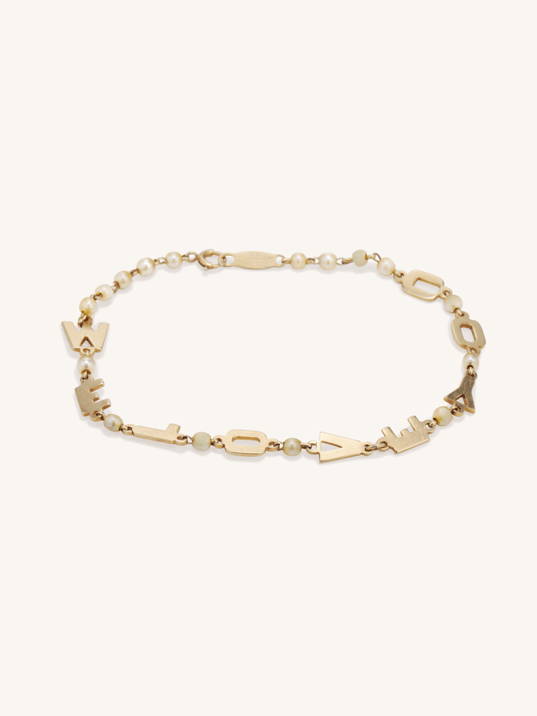 Vintage Lucien Piccard 14K gold and seed pearl “We Love You” bracelet, mid-century design circa 1950s