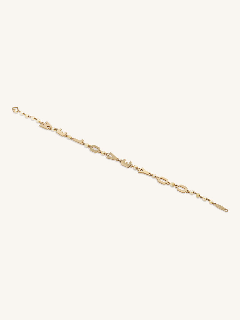 Vintage Lucien Piccard 14K gold and seed pearl “We Love You” bracelet, mid-century design circa 1950s - lay flat