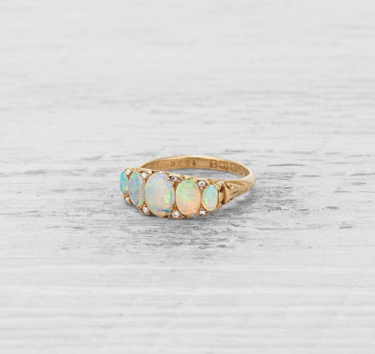 ANTIQUE OPAL FIVE STONE ENGAGEMENT RING