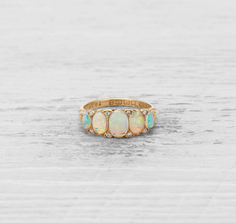 ANTIQUE OPAL FIVE STONE ENGAGEMENT RING
