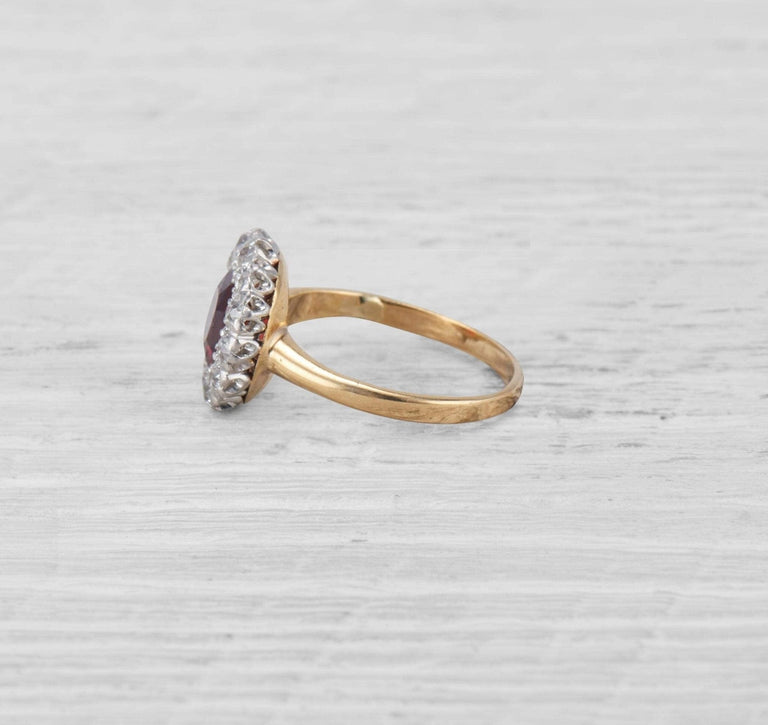 ANTIQUE VICTORIAN GARNET AND DIAMOND CLUSTER RING