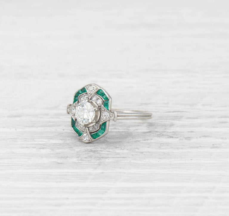 ART DECO DIAMOND AND EMERALD ENGAGEMENT RING