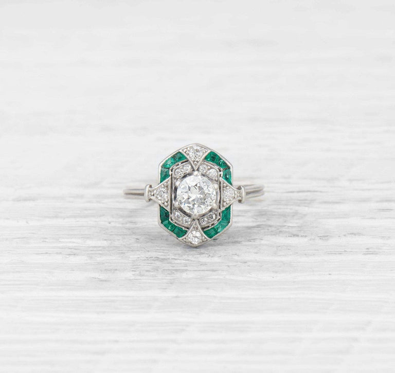 ART DECO DIAMOND AND EMERALD ENGAGEMENT RING
