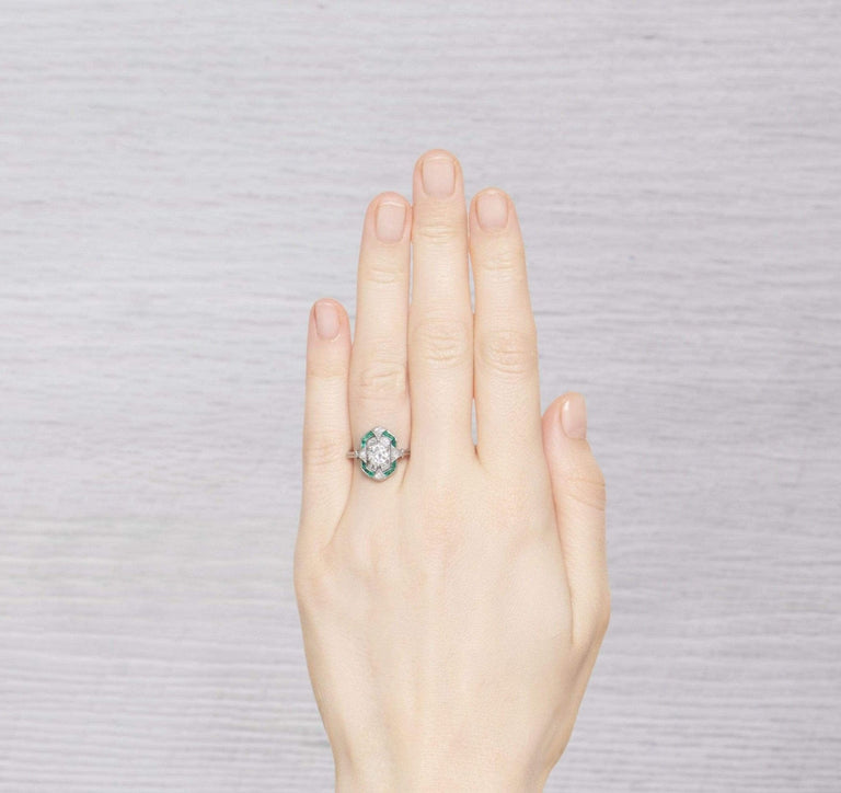 ART DECO DIAMOND AND EMERALD ENGAGEMENT RING