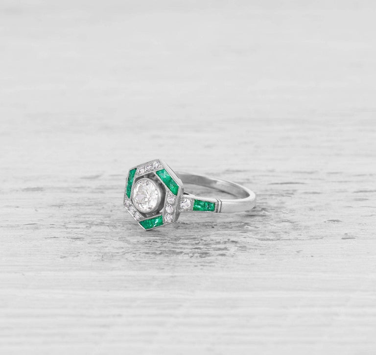 ART DECO DIAMOND AND EMERALD ENGAGEMENT RING
