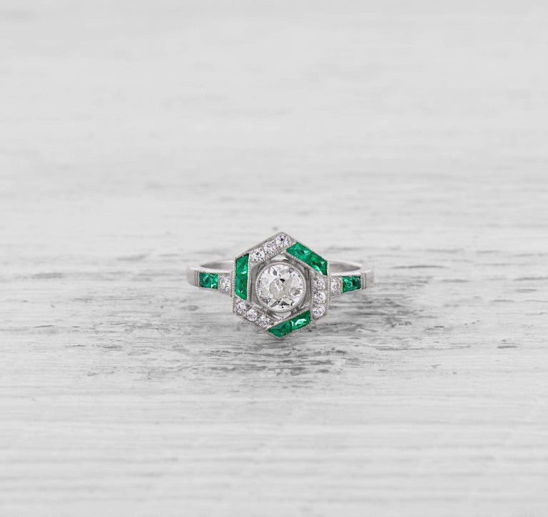 ART DECO DIAMOND AND EMERALD ENGAGEMENT RING