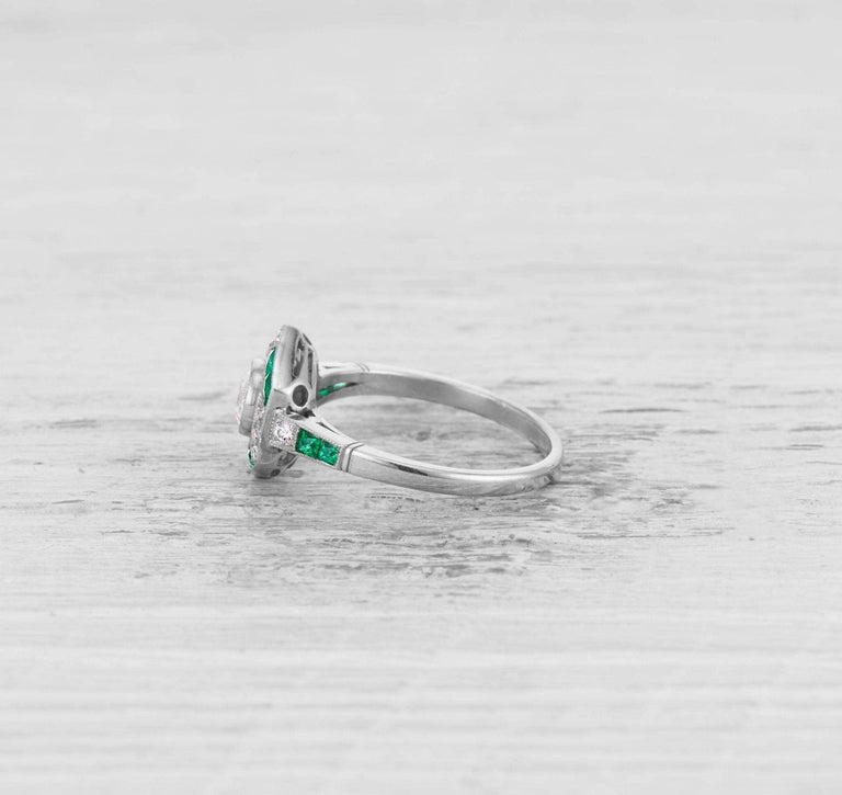 ART DECO DIAMOND AND EMERALD ENGAGEMENT RING