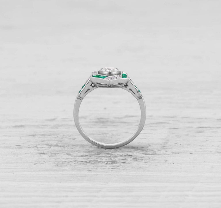 ART DECO DIAMOND AND EMERALD ENGAGEMENT RING