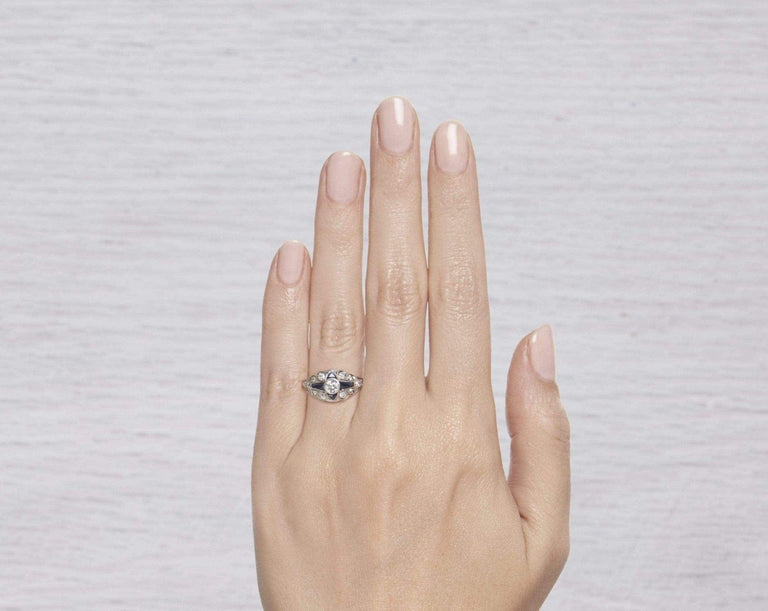 ART DECO DIAMOND AND SAPPHIRE ENGAGEMENT RING