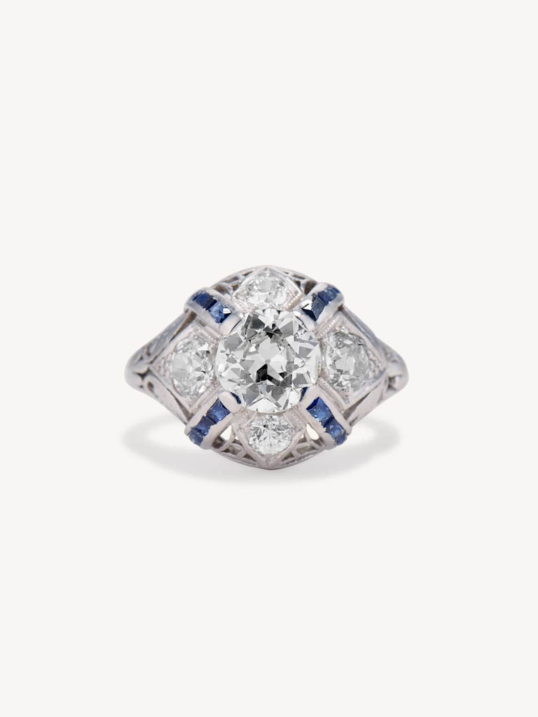 Art Deco 1.25 Carat Old European Cut Diamond and Sapphire Bombé Vintage Engagement Ring