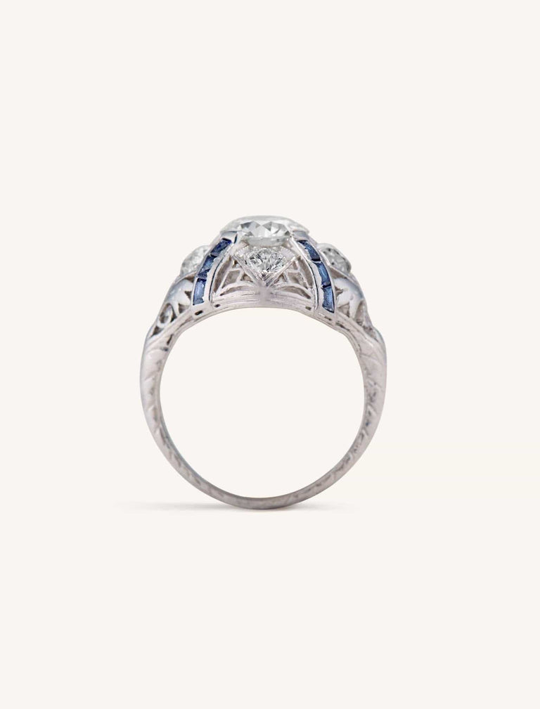Art Deco 1.25 Carat Old European Cut Diamond and Sapphire Bombé Vintage Engagement Ring