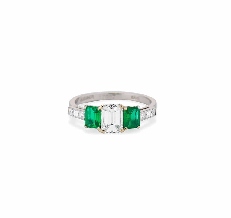 Cartier 1970's Emerald and Diamond Three-Stone Ring, England