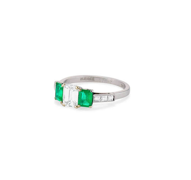 Cartier 1970's Emerald and Diamond Three-Stone Ring, England