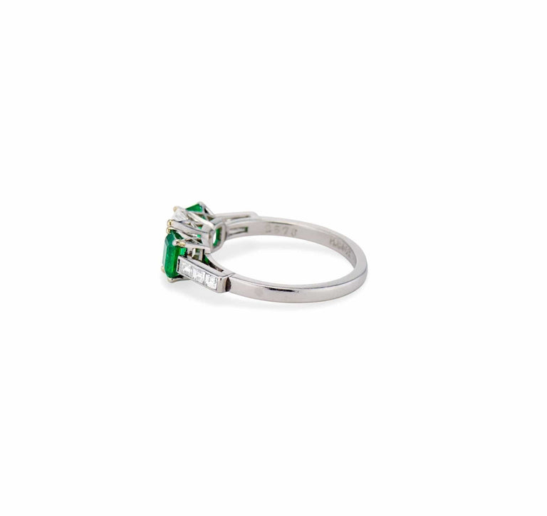 Cartier 1970's Emerald and Diamond Three-Stone Ring, England