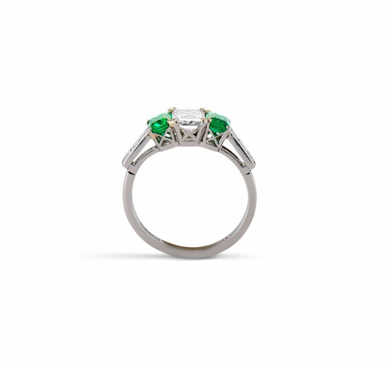Cartier 1970's Emerald and Diamond Three-Stone Ring, England