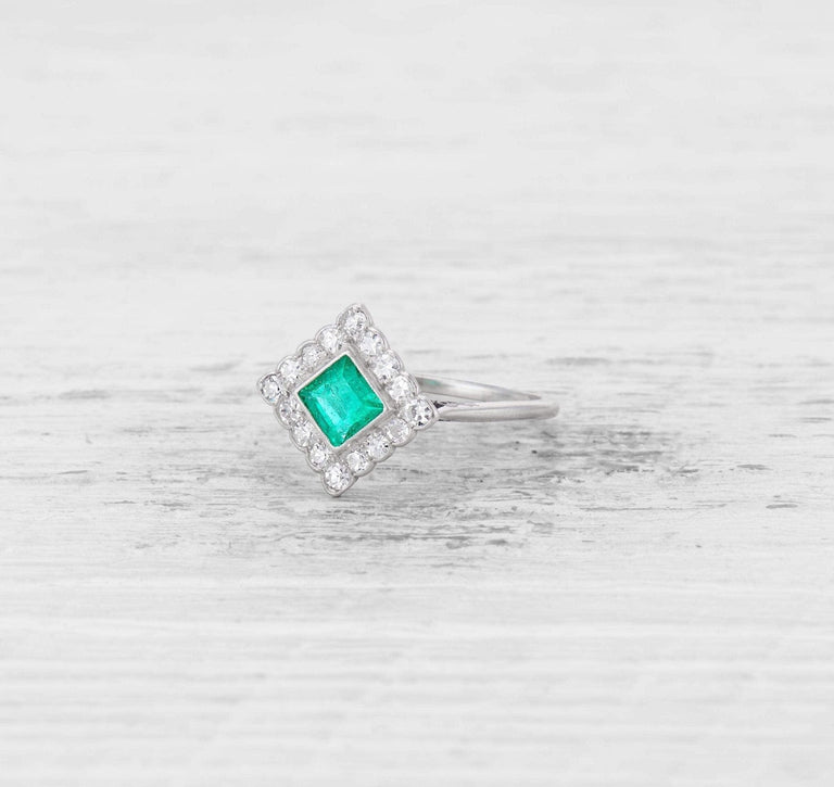 EARLY ART DECO EMERALD AND DIAMOND RING