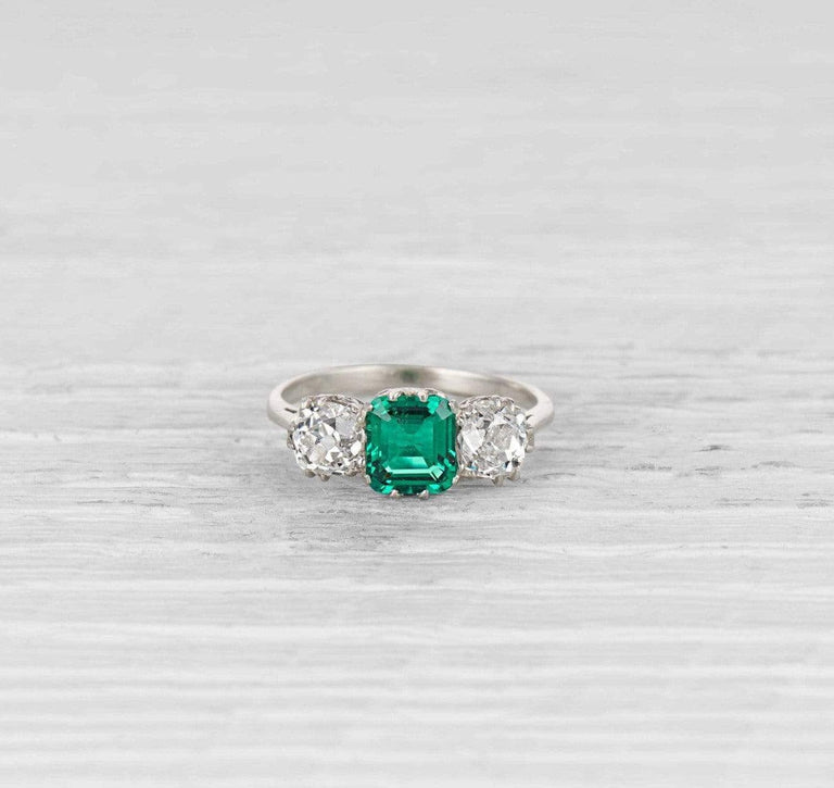 Early Art Deco Emerald and Diamond Three Stone Ring