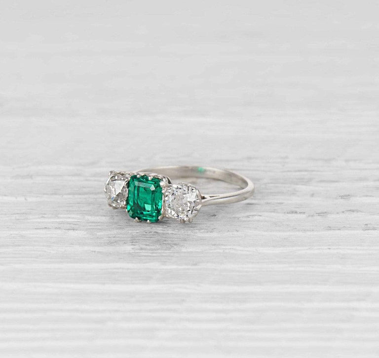 Early Art Deco Emerald and Diamond Three Stone Ring