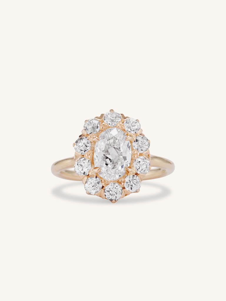 Edwardian 1.13 Carat Oval Shaped Diamond Cluster Engagement Ring